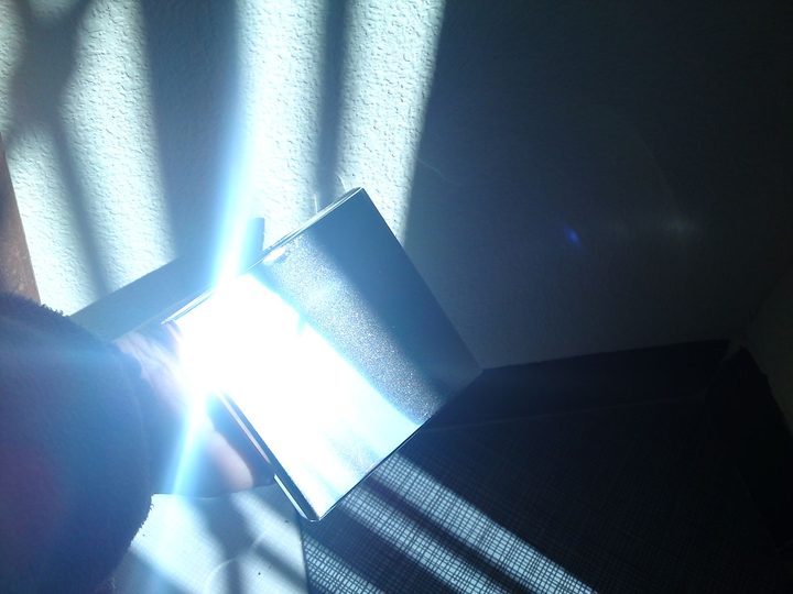 A REFLEXIS mirror prototype reflects a flash of sunlight